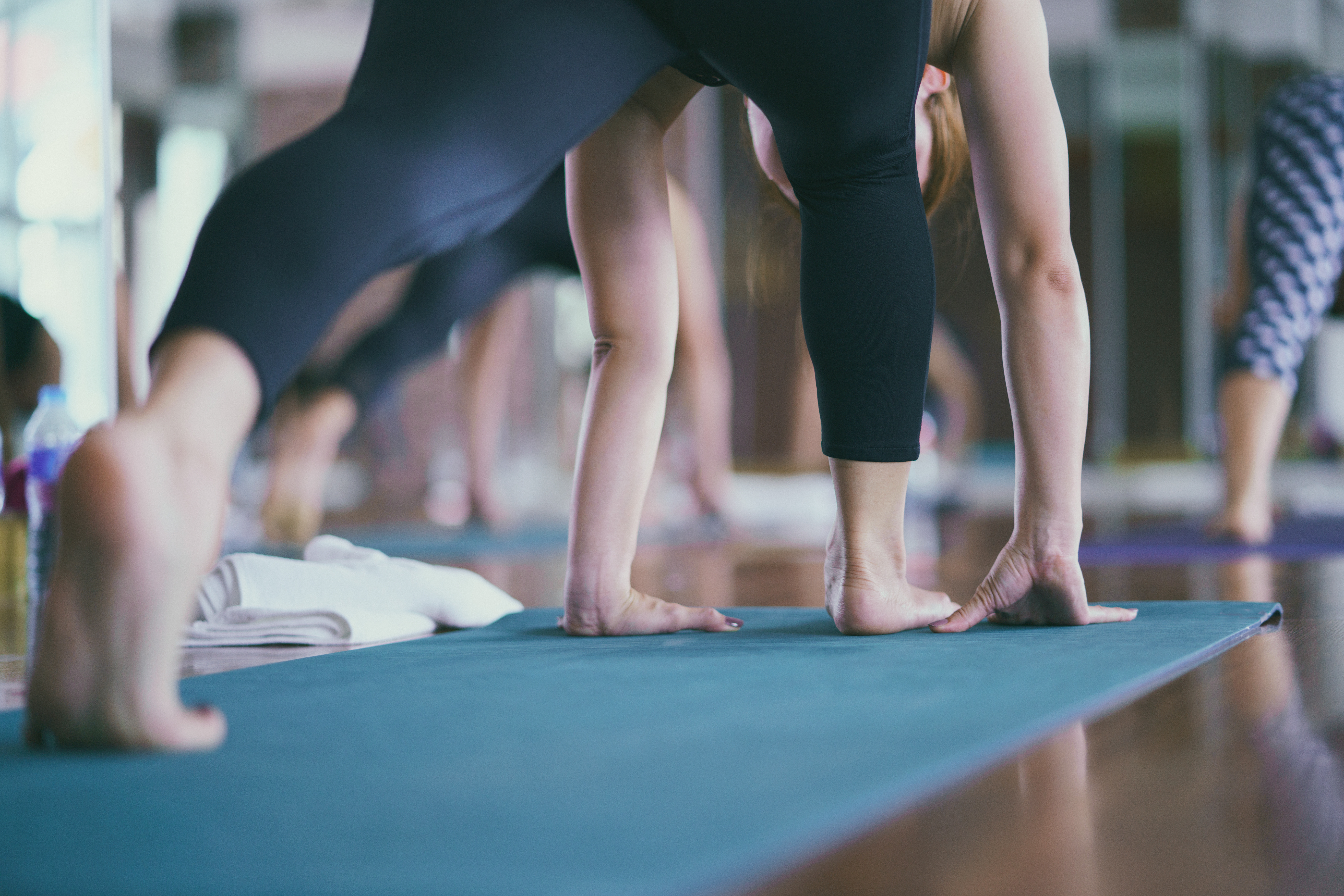 Women exercising in fitness studio yoga classes